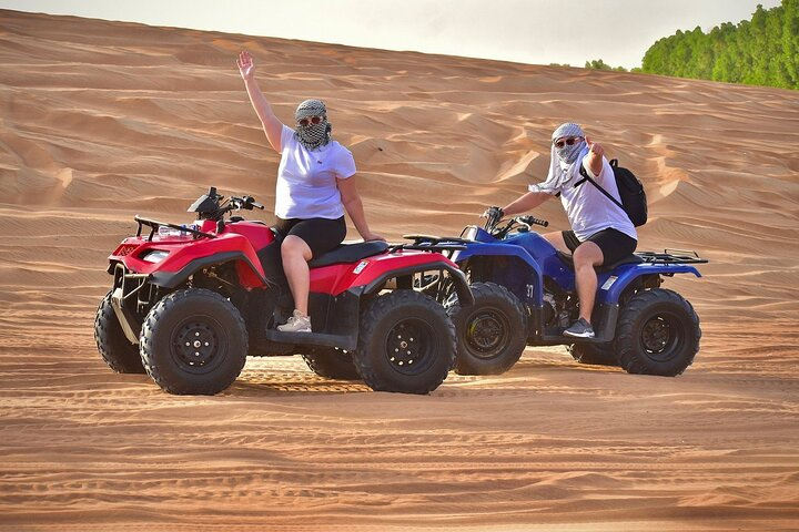 VIP Desert Safari with Quad Bike, Camel Ride, Sandboard and BBQ - Photo 1 of 22